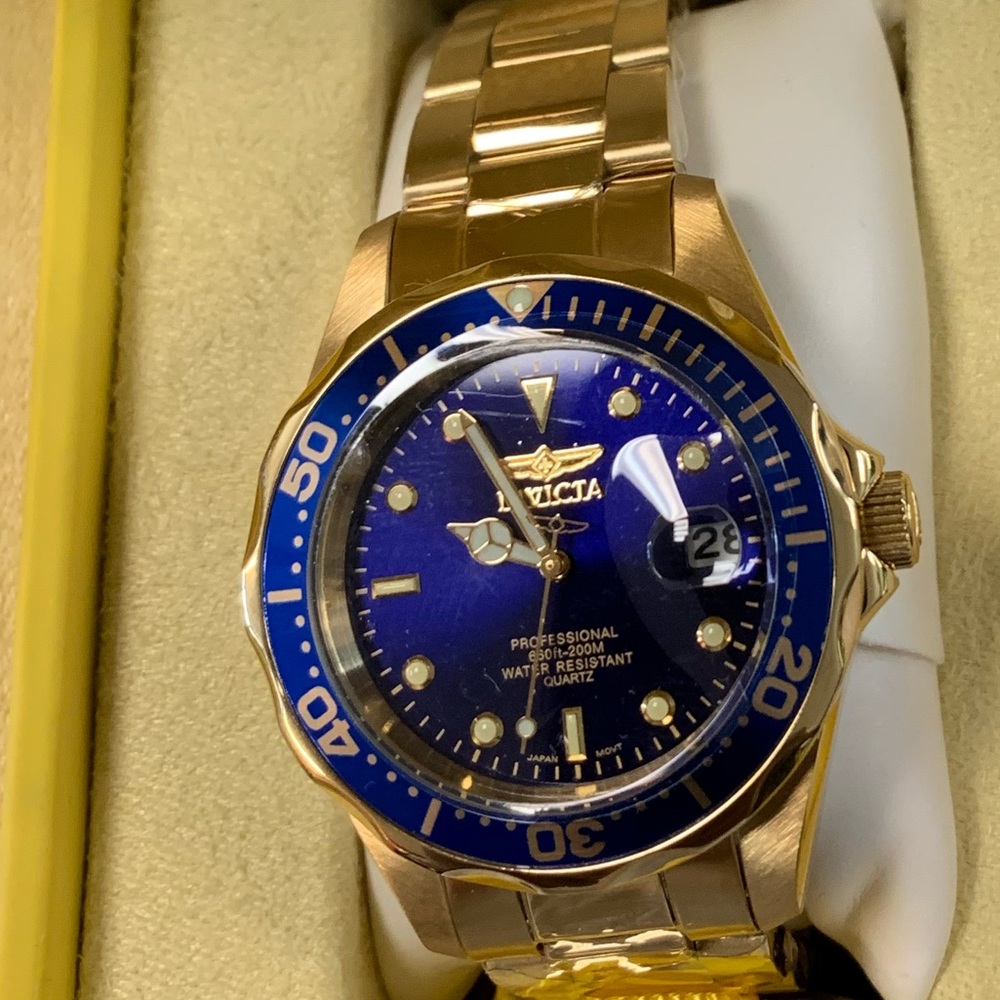 Men’s invicta watches new in box